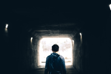 man standing in subway