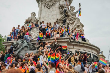 people gathering in front of statue