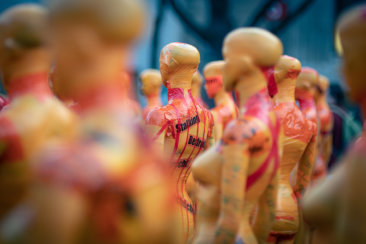 woman in red jersey figurine