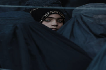 woman in blue hijab and abaya