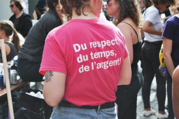 woman standing near group of people