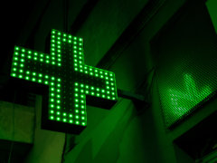 green and white x sign