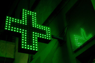 green and white x sign