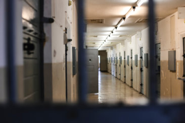 a long hallway with a bunch of lockers in it