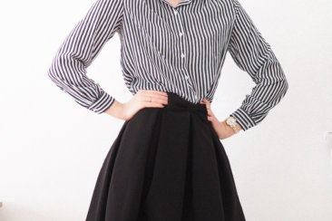 woman in black and white striped long sleeve dress