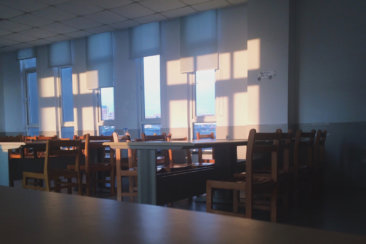 brown wooden chairs and tables