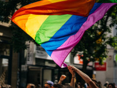 people holding flags during daytime