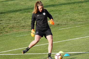 woman playing soccer