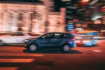 Photo of SUV on Road during Night Time