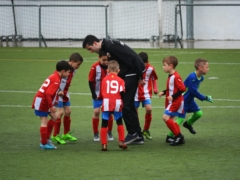 children playing soccer