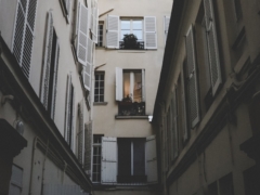 low angle photography of white concrete building at daytime